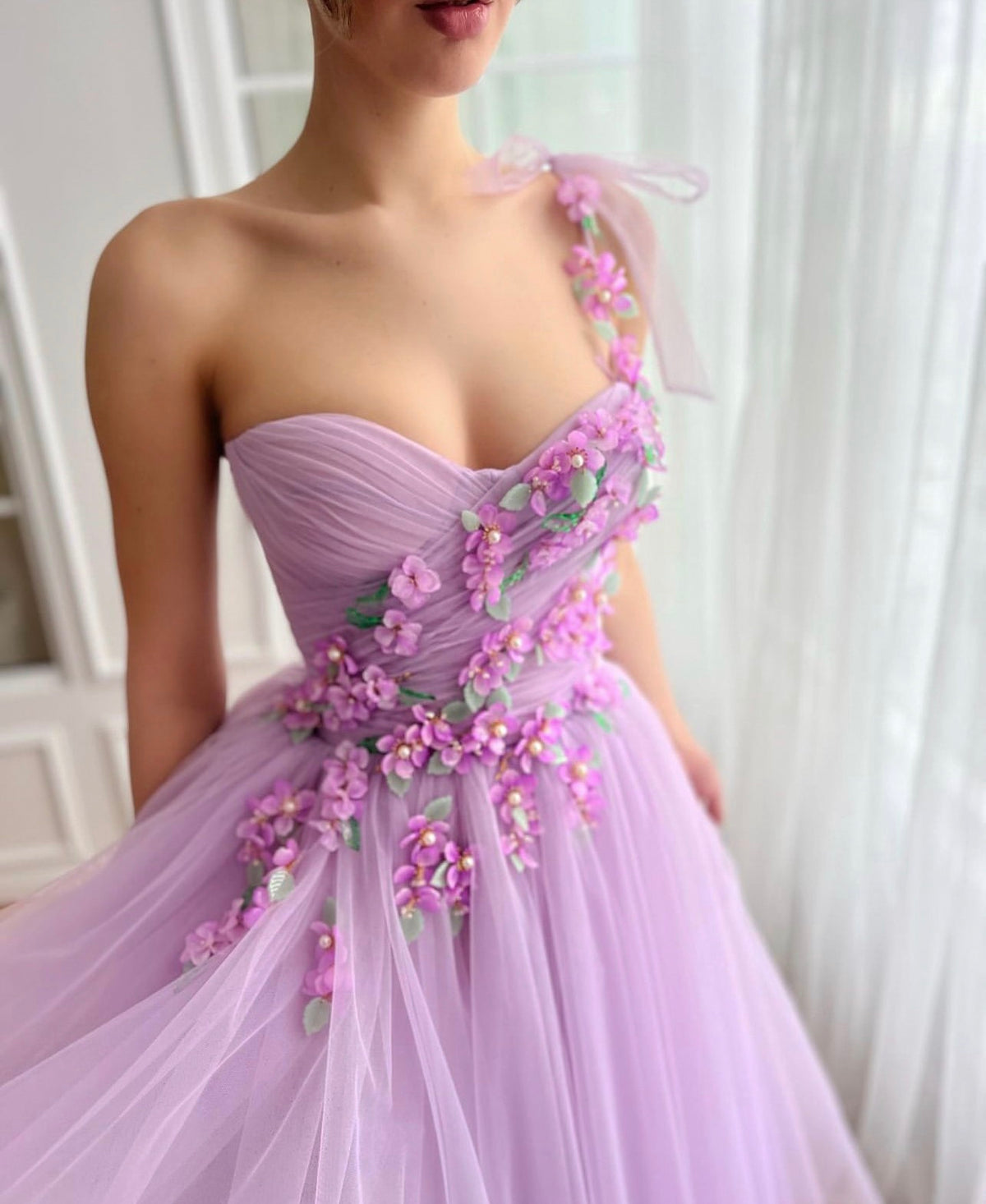 Purple midi dress with one shoulder strap and embroidered flowers
