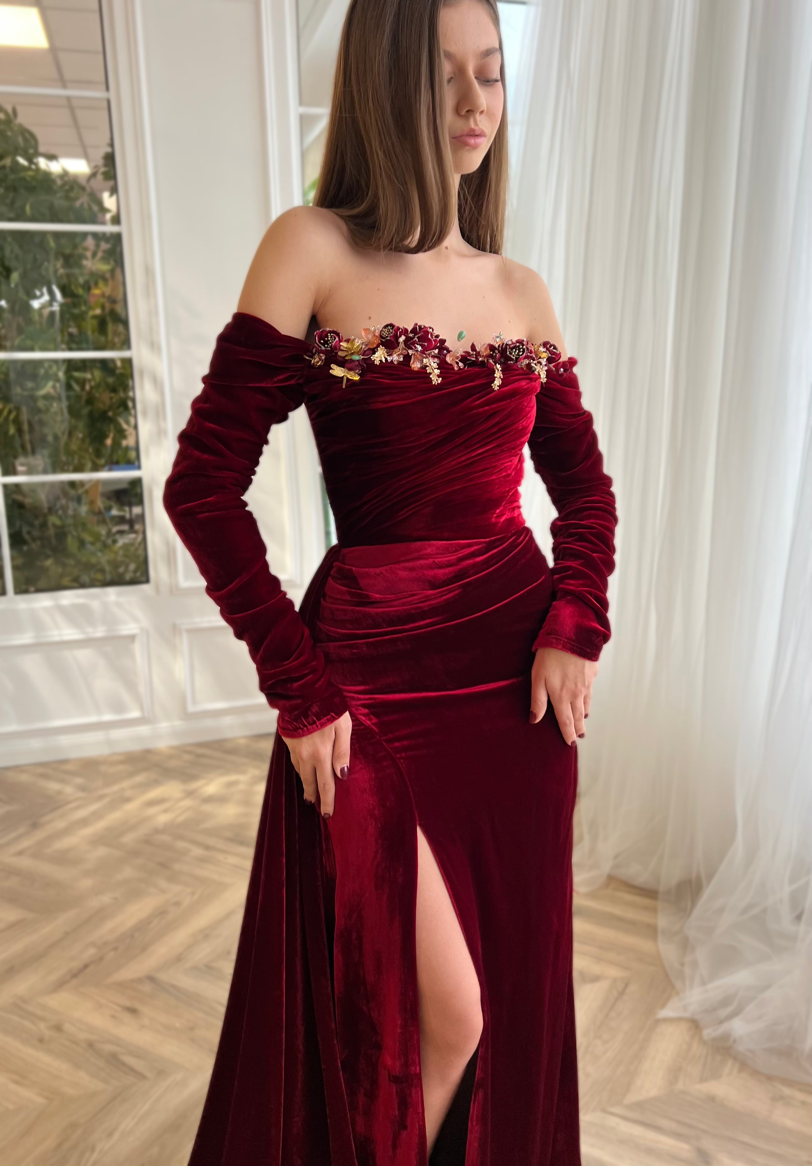 Red mermaid dress with long off the shoulder sleeves and embroidery