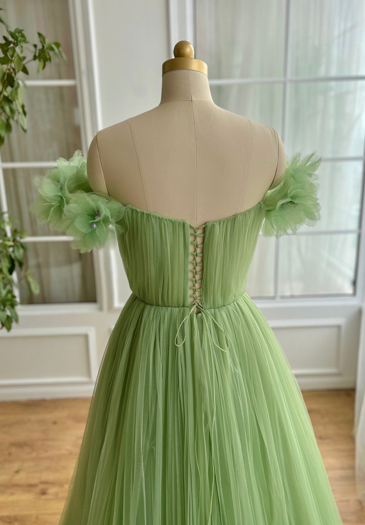 Green A-Line dress with off the shoulder sleeves and embroidery