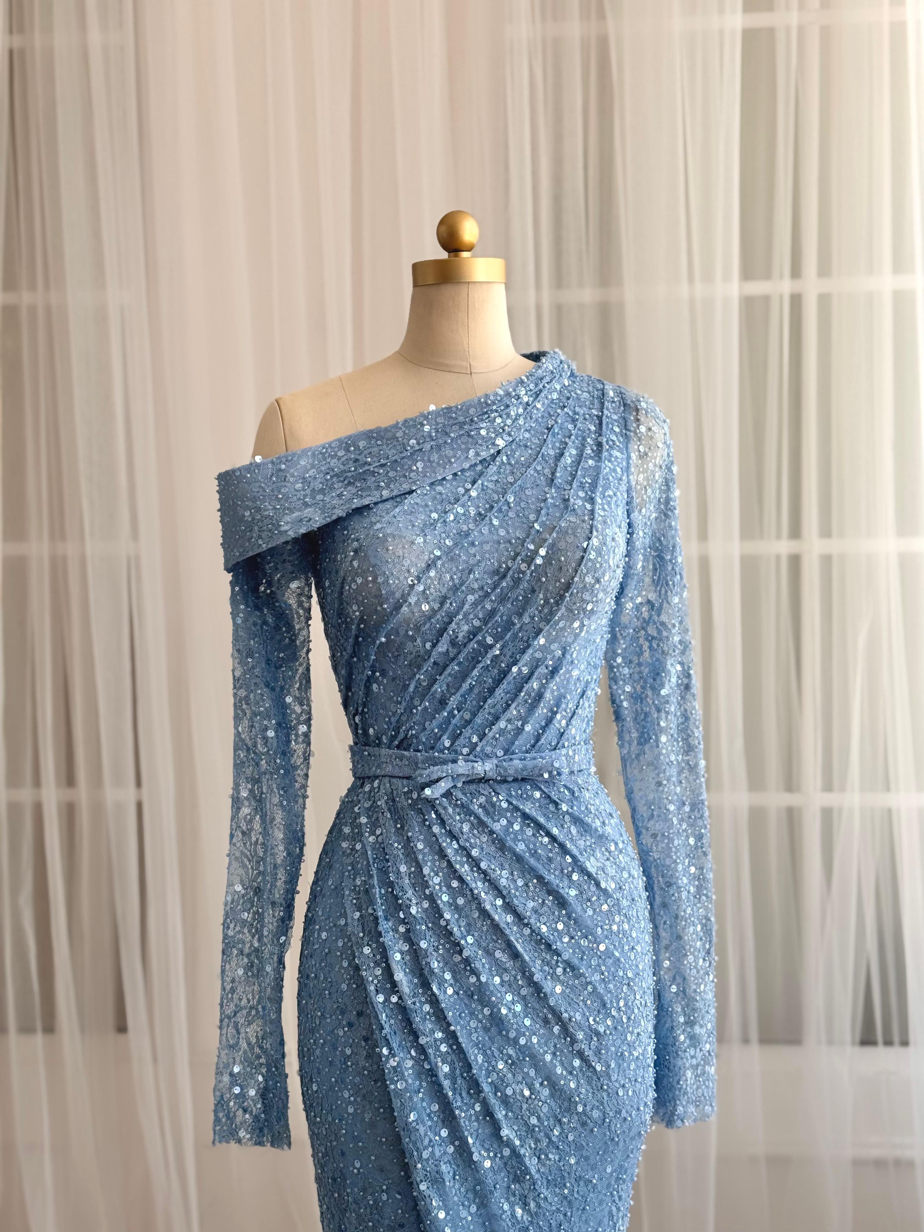 Blue mermaid dress with long sleeves and sequin fabric