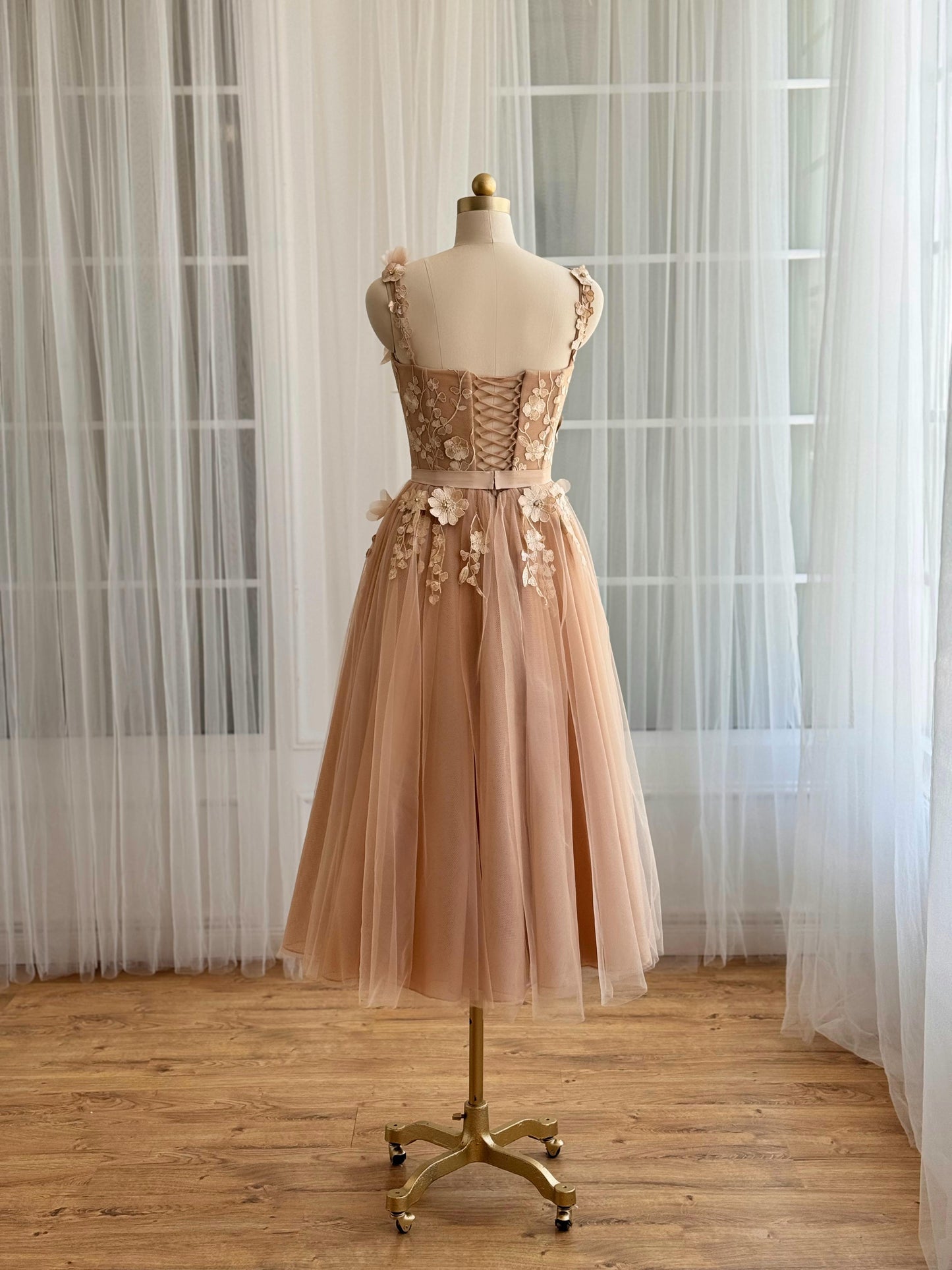 Beige midi dress with embroidered flowers and straps