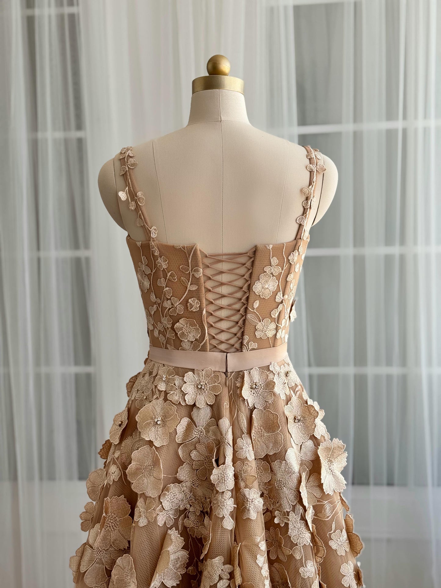 Beige A-Line dress with straps and embroidered flowers