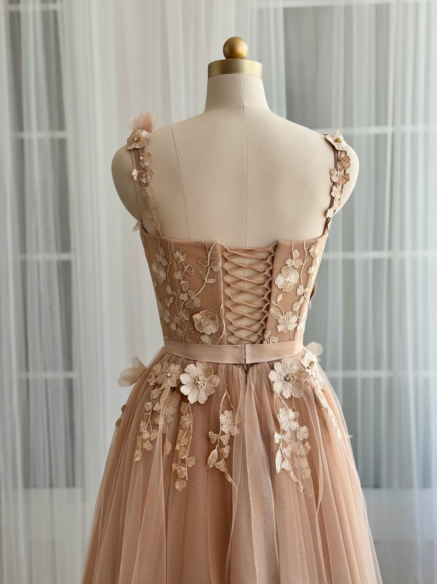 Beige midi dress with embroidered flowers and straps