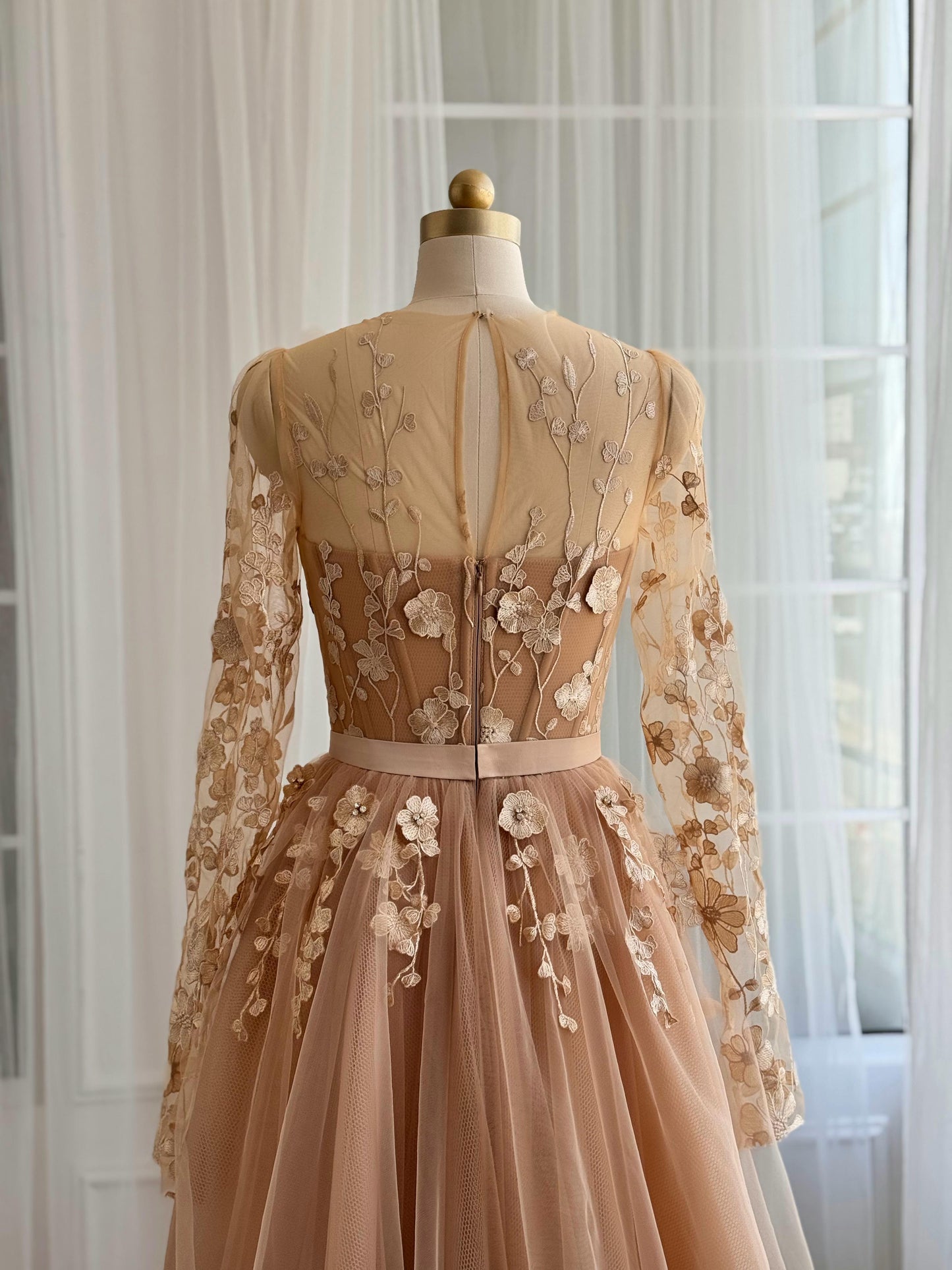 Beige A-Line dress with long sleeves and embroidered flowers
