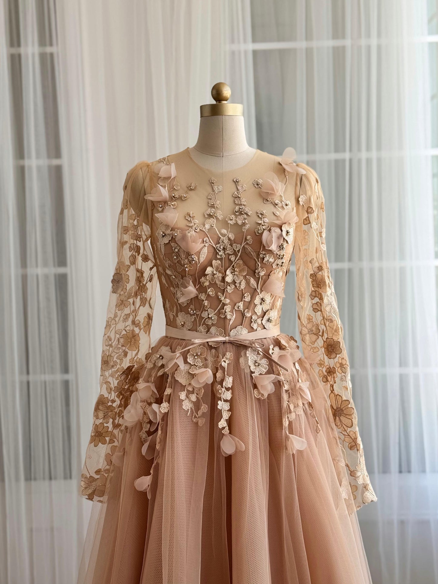 Beige A-Line dress with long sleeves and embroidered flowers