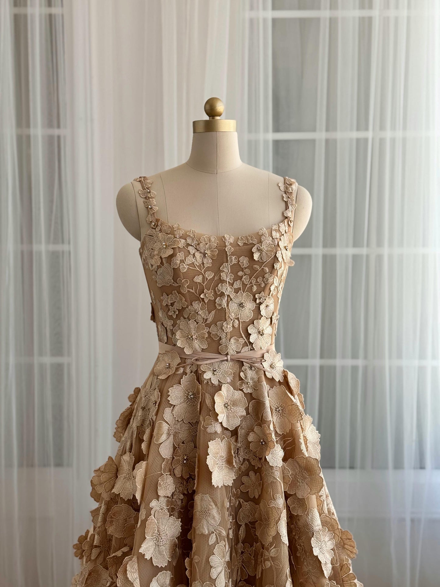 Beige A-Line dress with straps and embroidered flowers