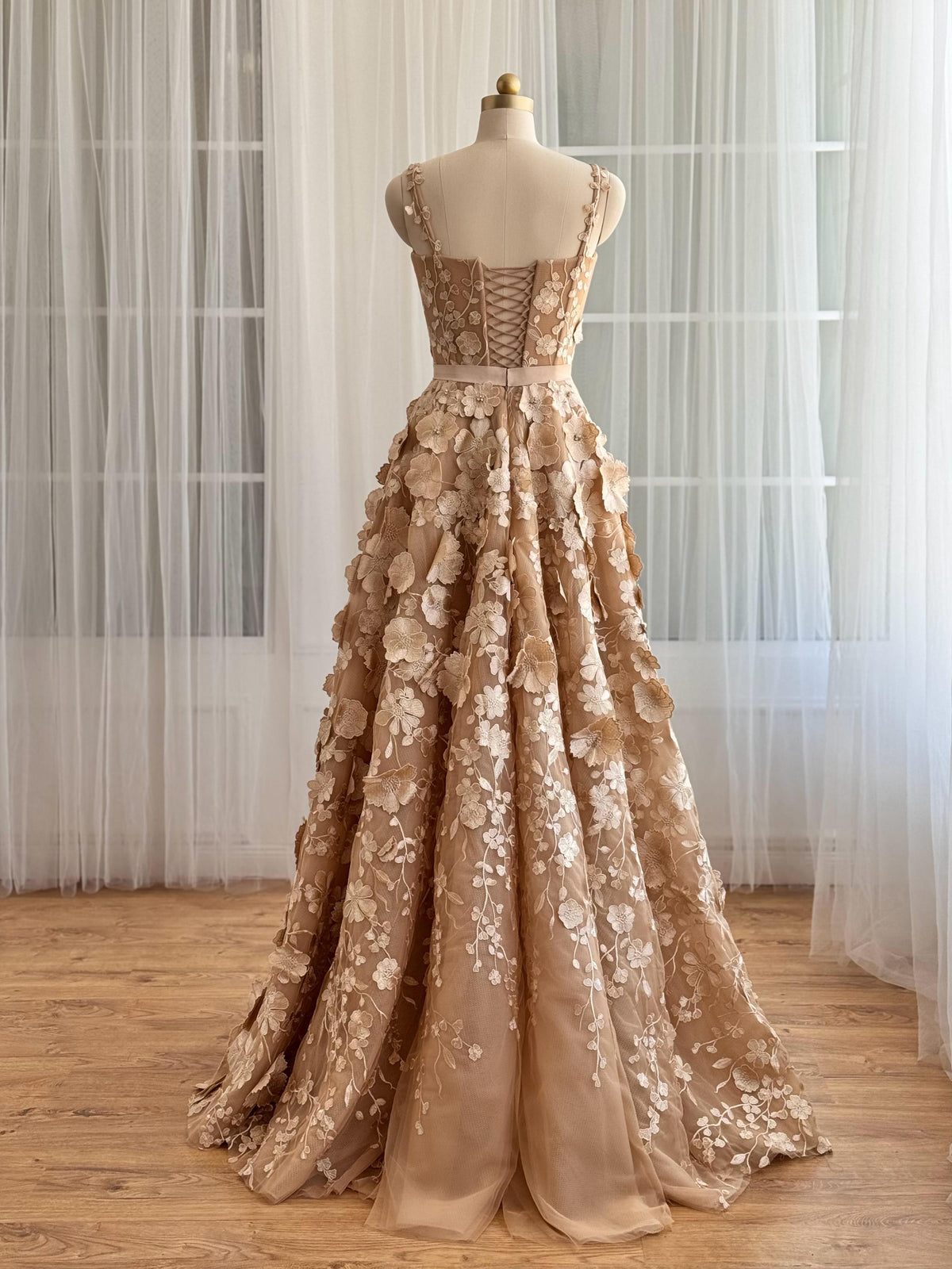 Beige A-Line dress with straps and embroidered flowers