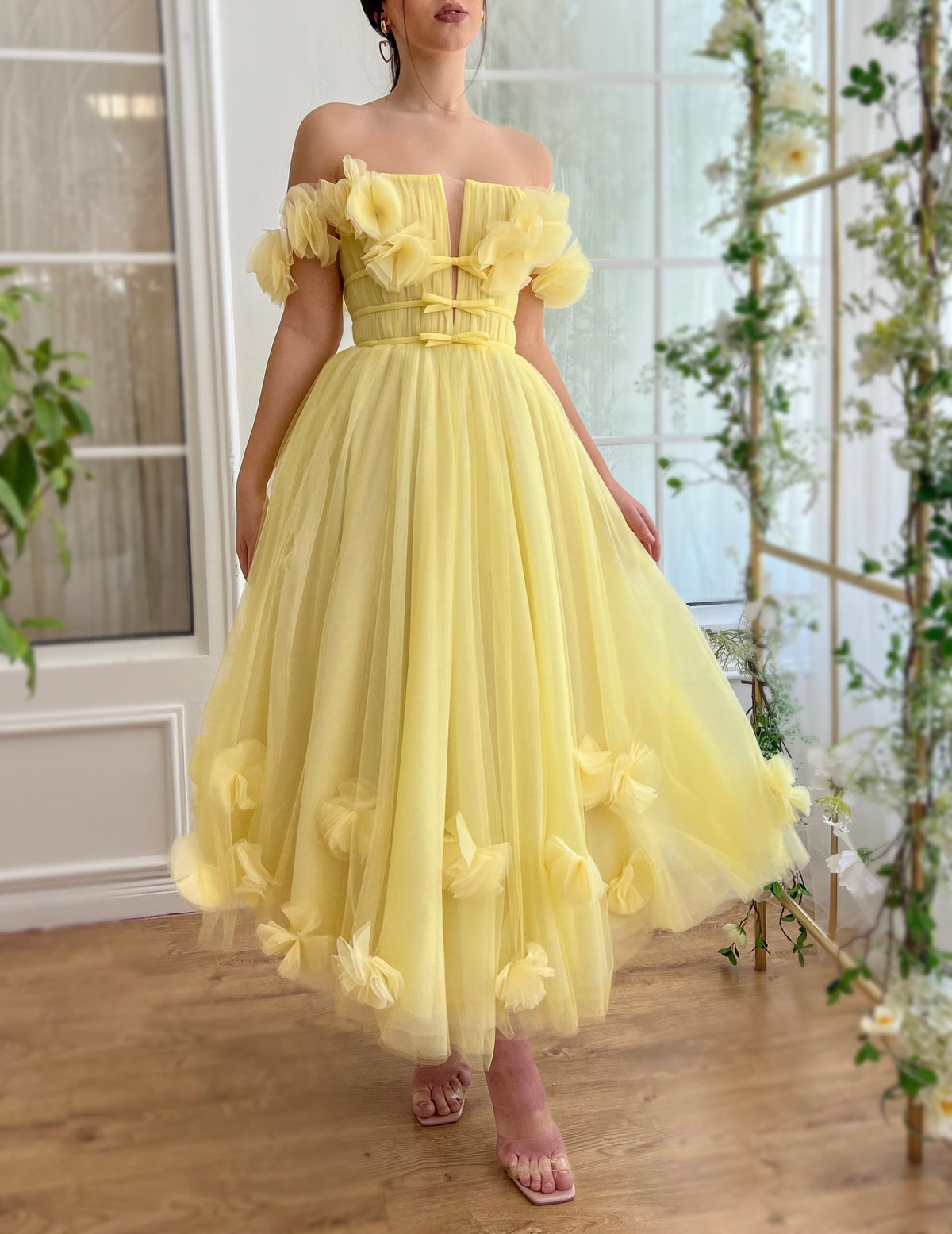Yellow midi dress with off the shoulder sleeves and embroidery