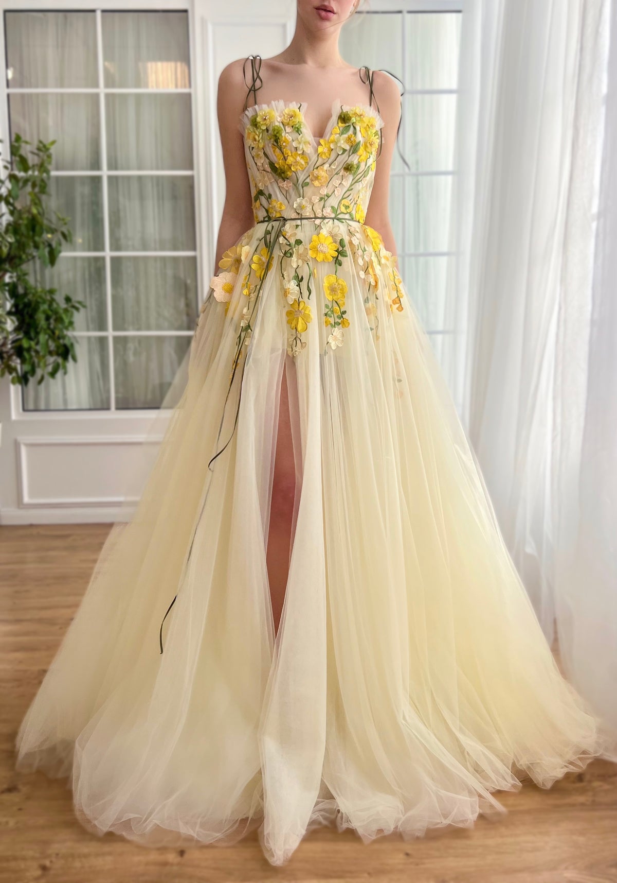 Yellow A-Line dress with spaghetti straps and embroidered flowers