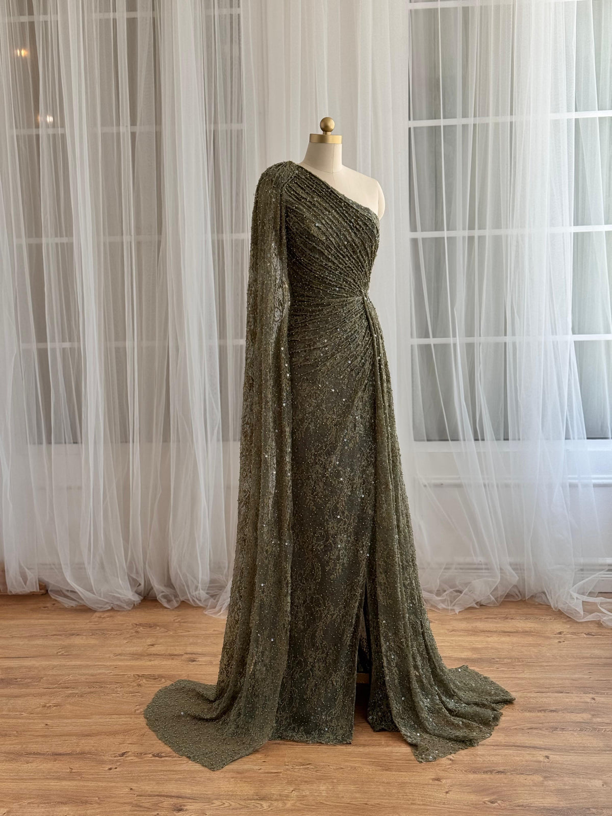Green mermaid dress with one shoulder cape sleeve