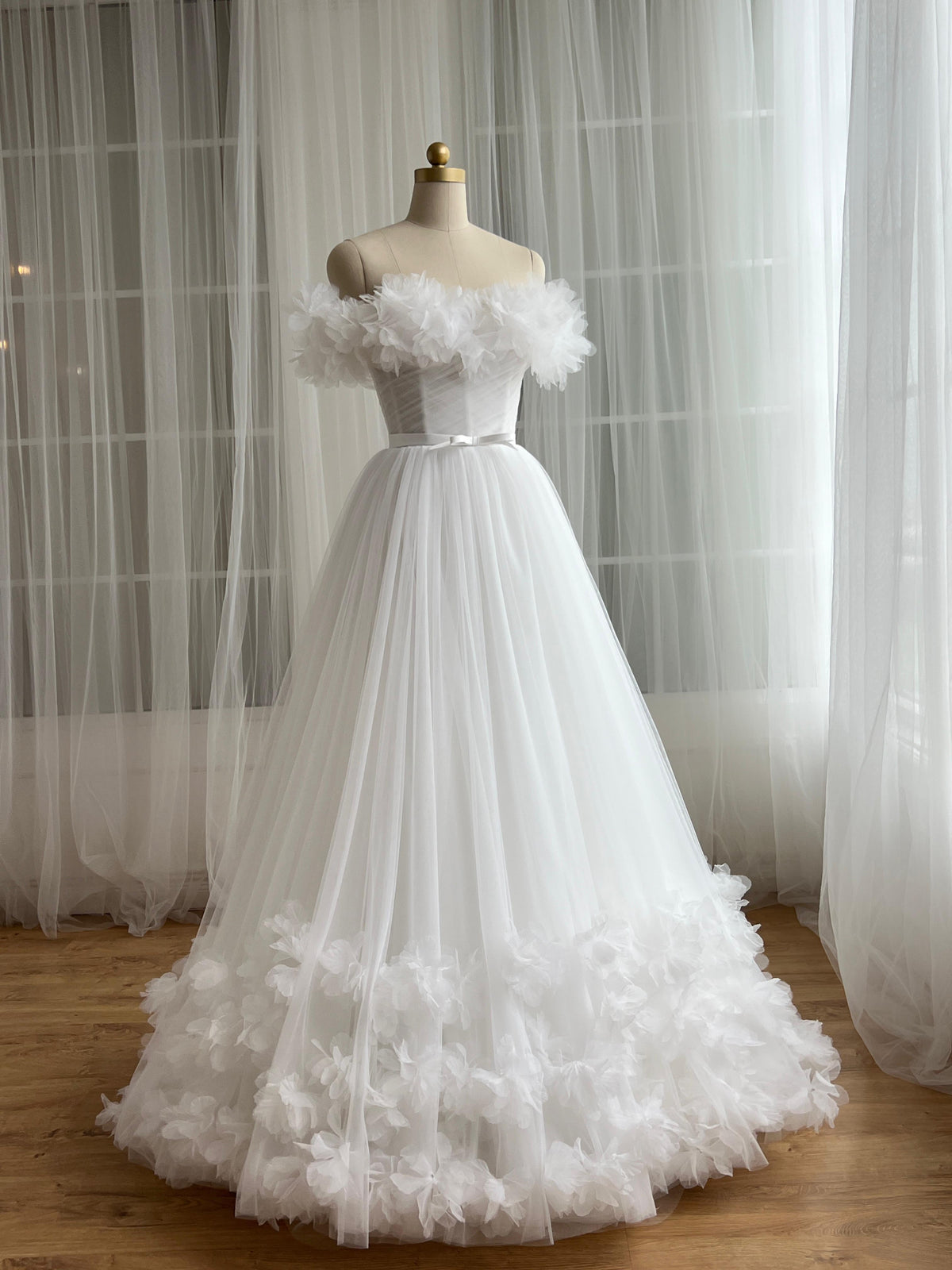 White bridql A-Line gown with embroidery, tulle and off the shoulder sleeves