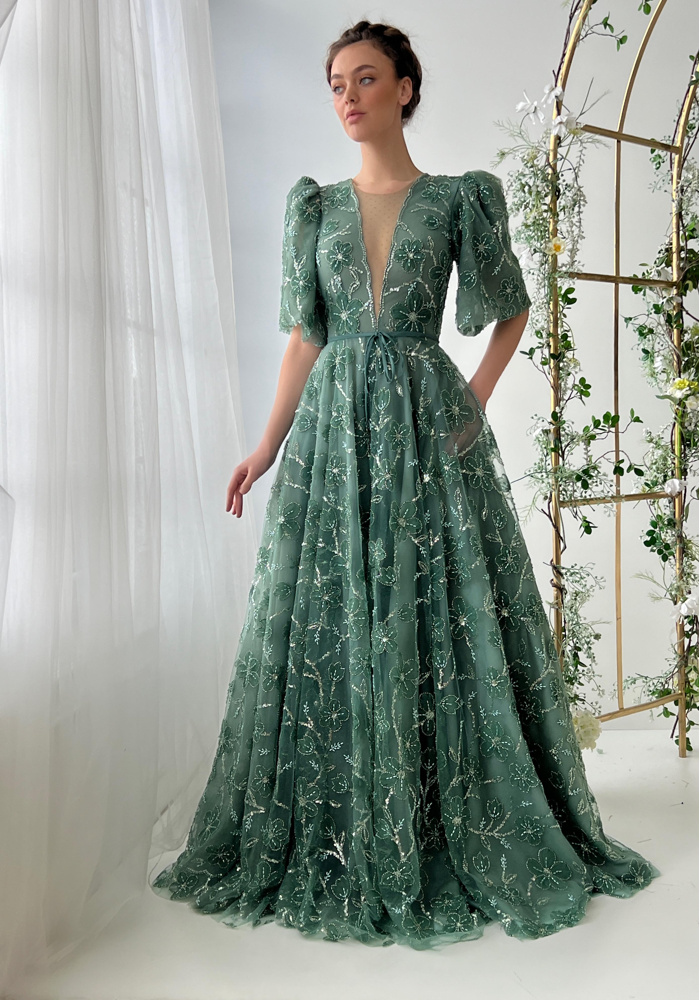 Green A-Line dress with v-neck, short sleeves and embroidery