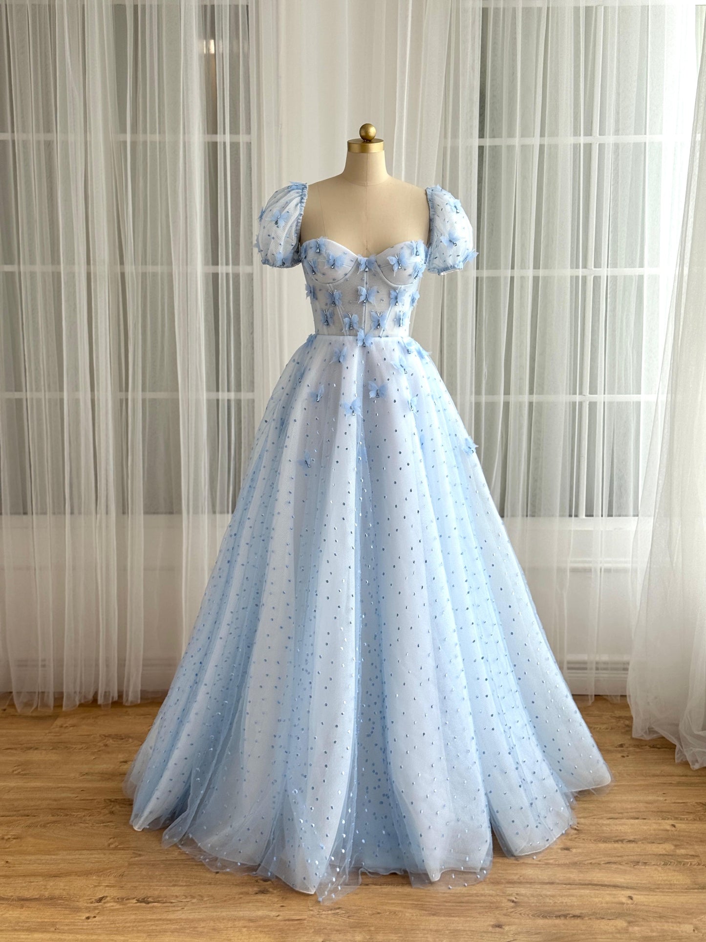 Blue A-Line dress with short sleeves and embroidered butterflies