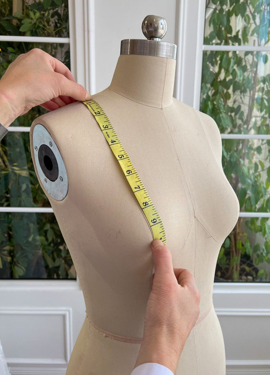 Shoulder to tip of breast