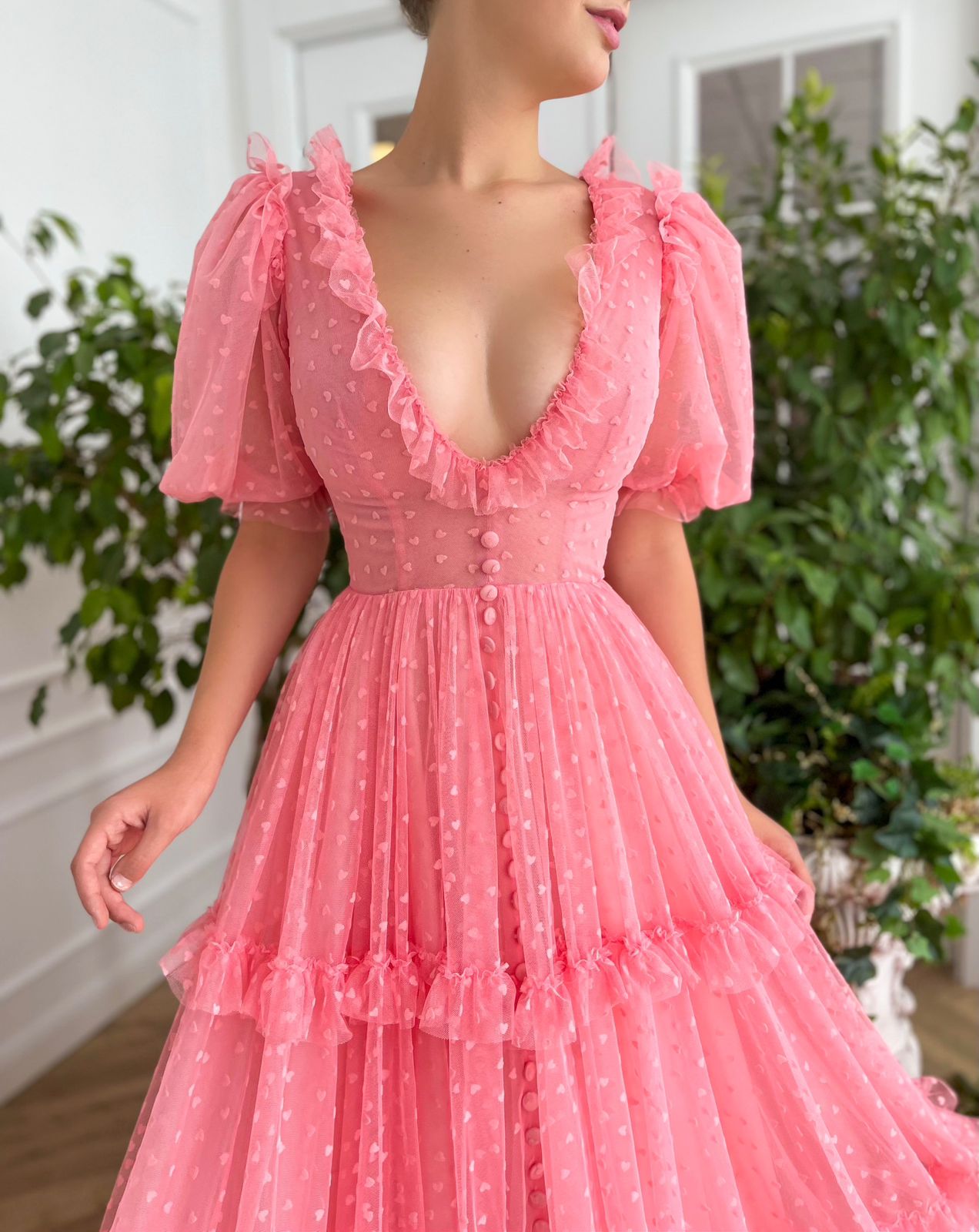 Pink A-Line dress with v-neck, short sleeves, ruffles and hearty fabric