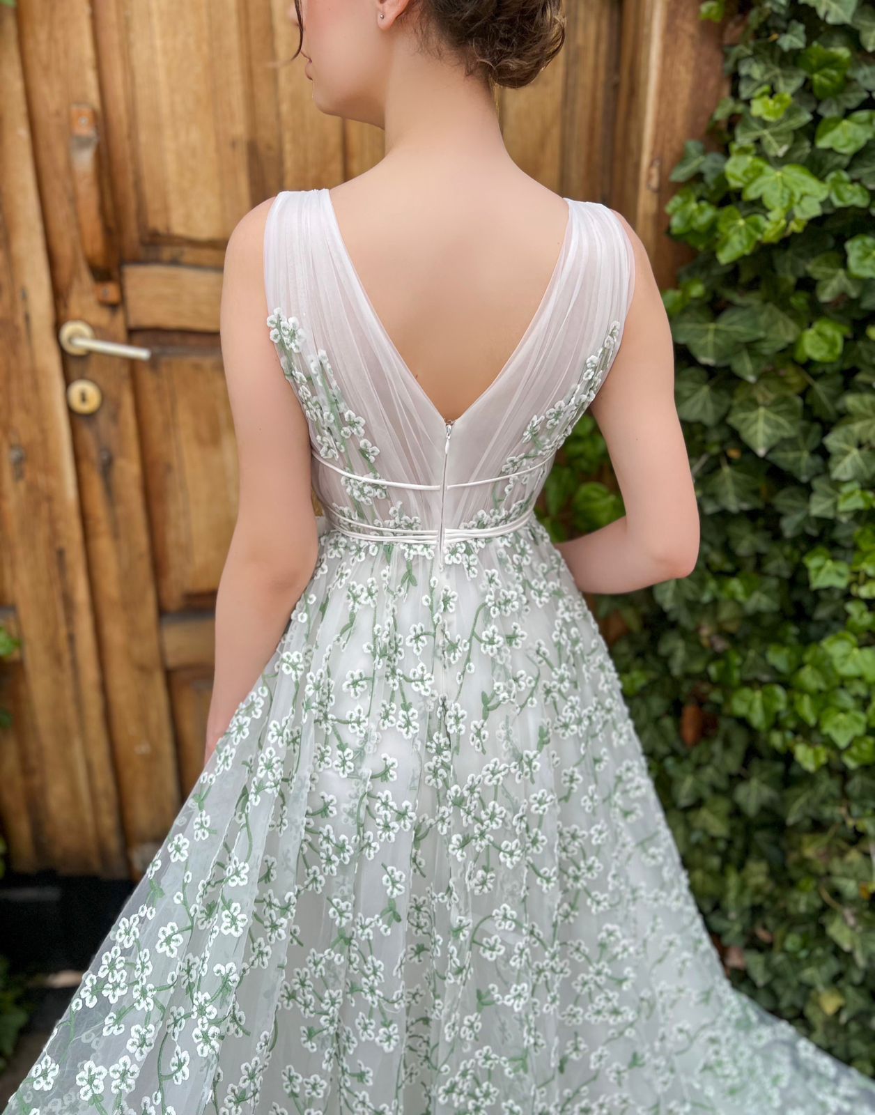 White A-Line dress with lace, no sleeves and v-neck