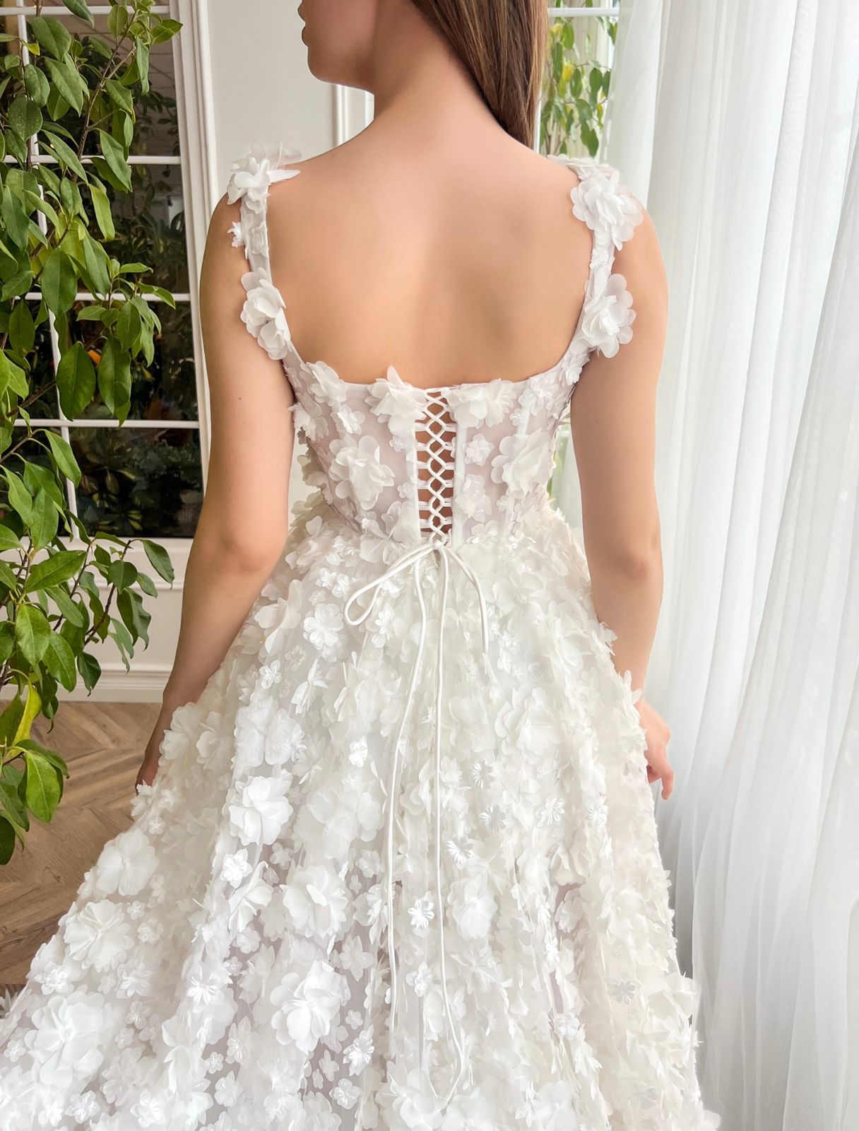 White A-Line bridal dress with spaghetti straps, lace and embroidery