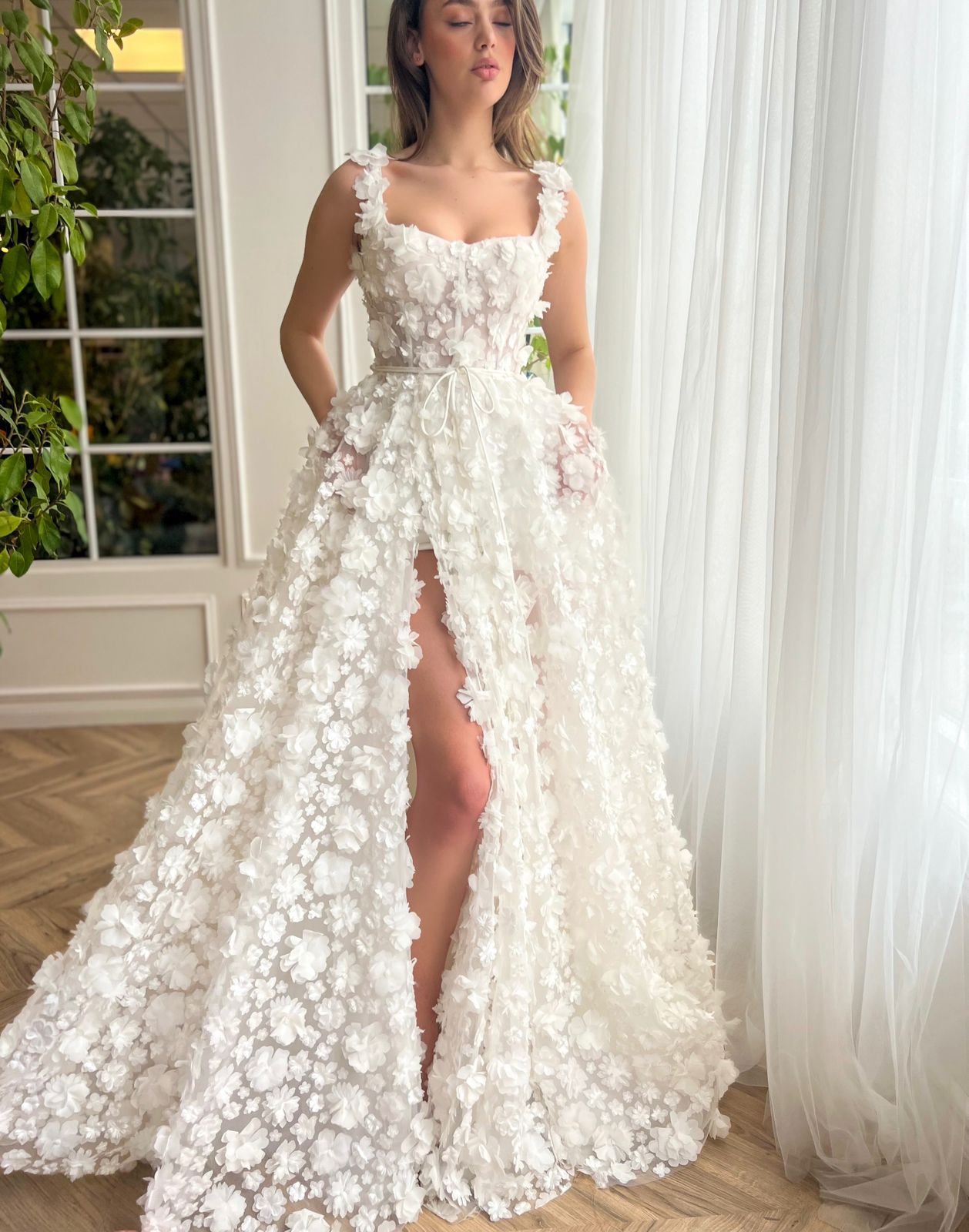 White A-Line bridal dress with spaghetti straps, lace and embroidery