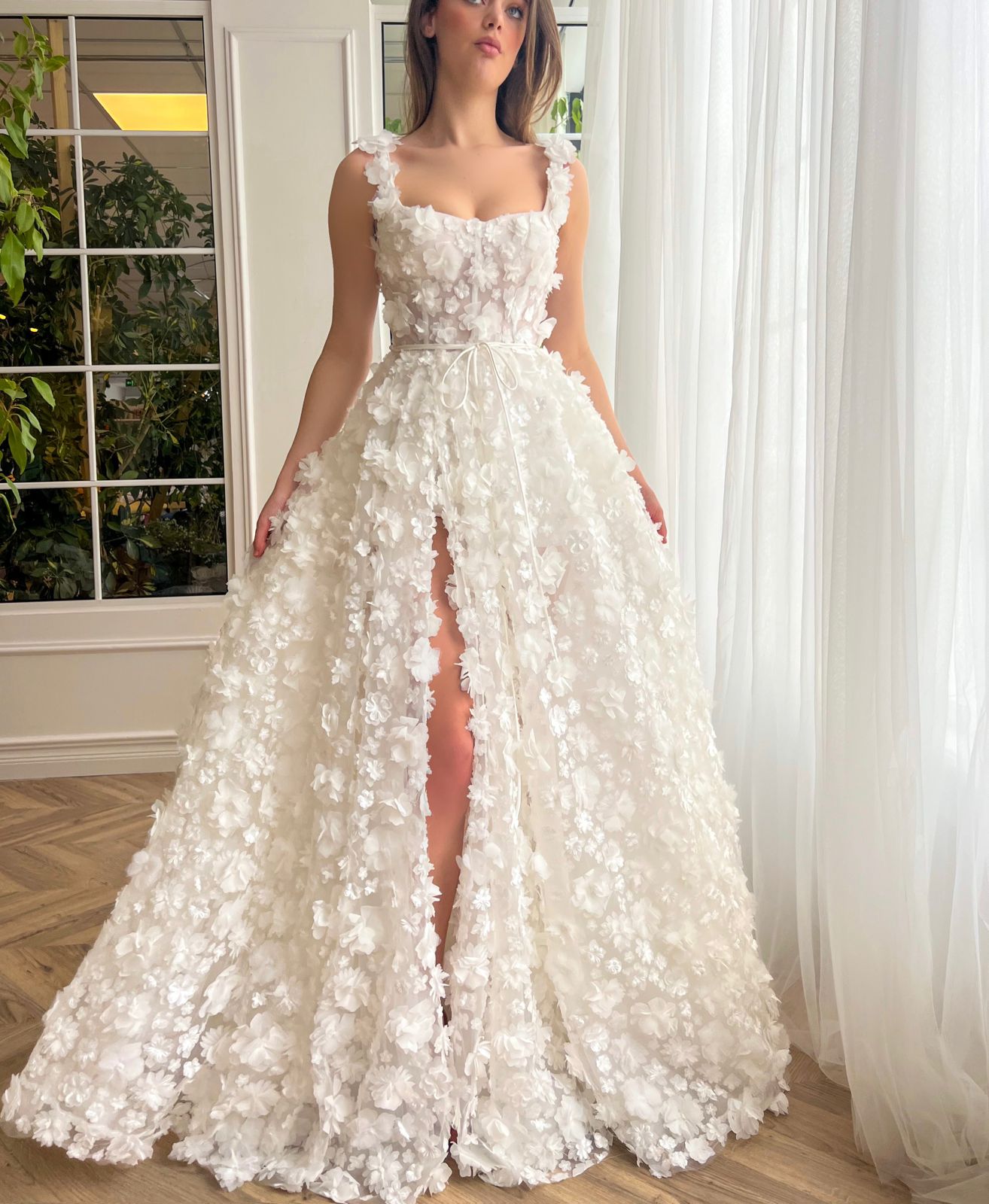 White A-Line bridal dress with spaghetti straps, lace and embroidery