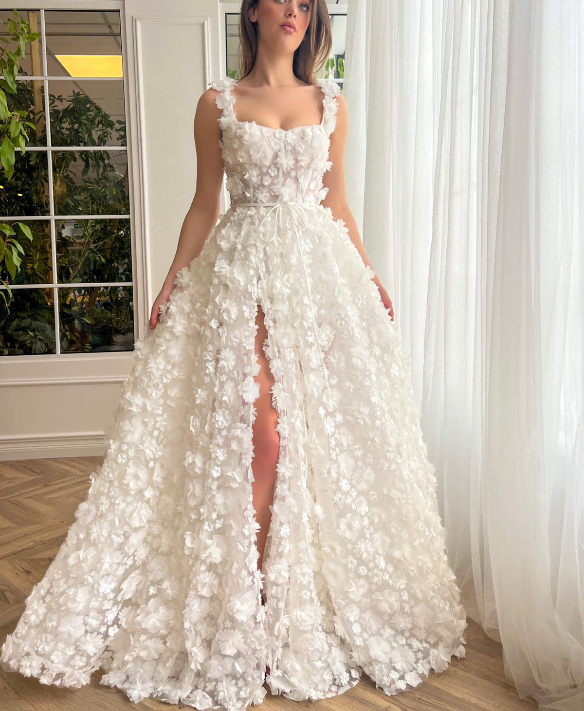 White A-Line bridal dress with spaghetti straps, lace and embroidery
