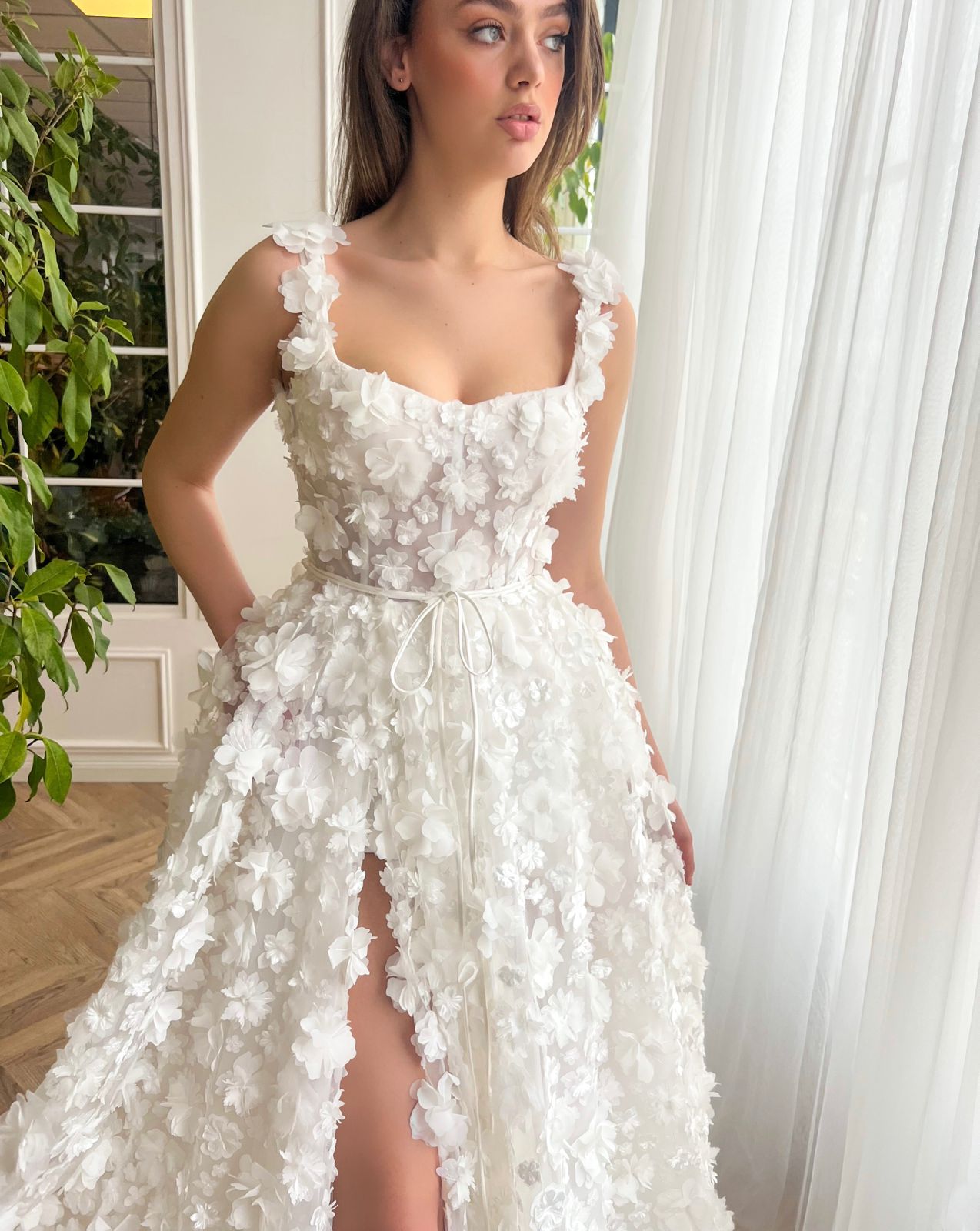 White A-Line bridal dress with spaghetti straps, lace and embroidery