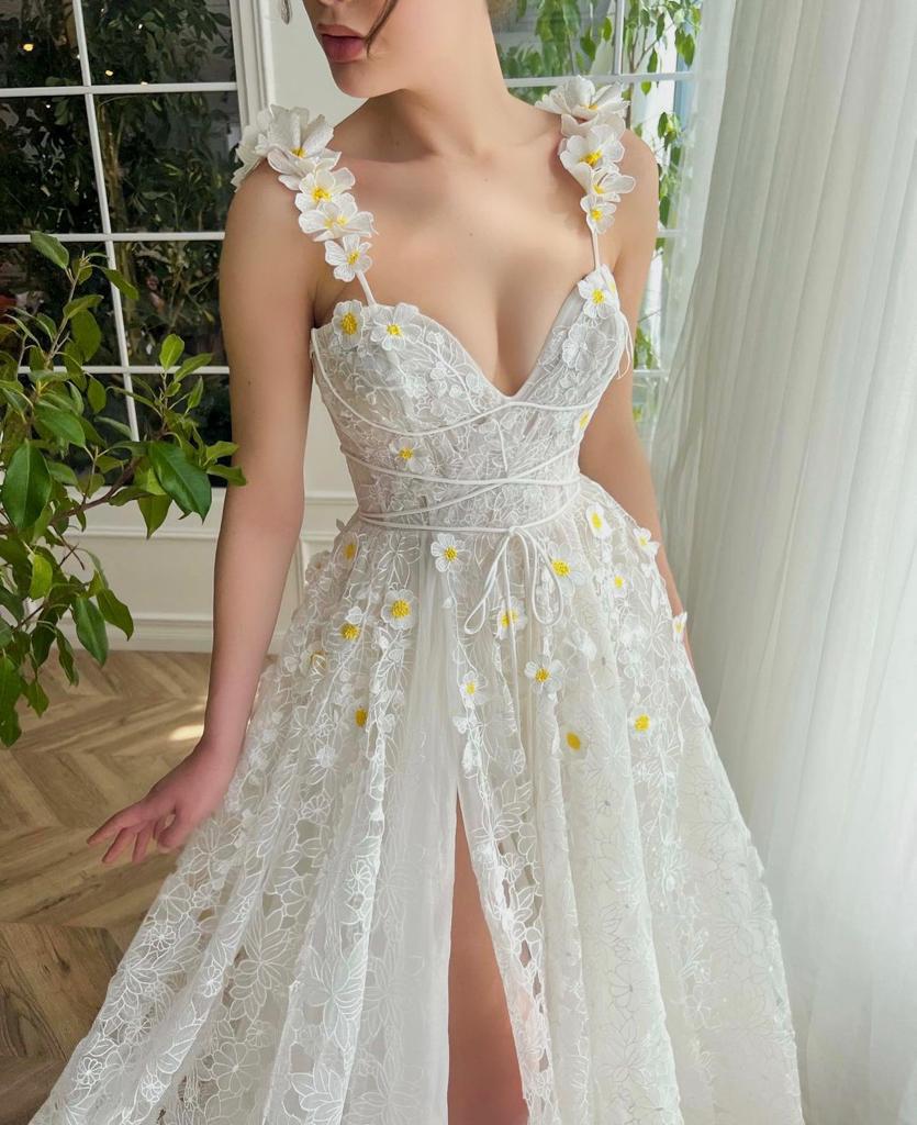 White A-Line bridal dress with spaghetti straps, embroidery and v-neck
