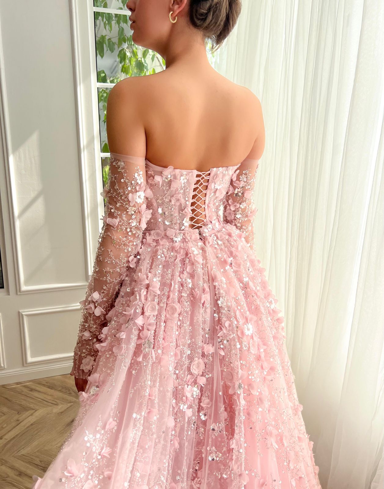 Pink overskirt and A-Line dress with long off the shoulder sleeves and embroidery
