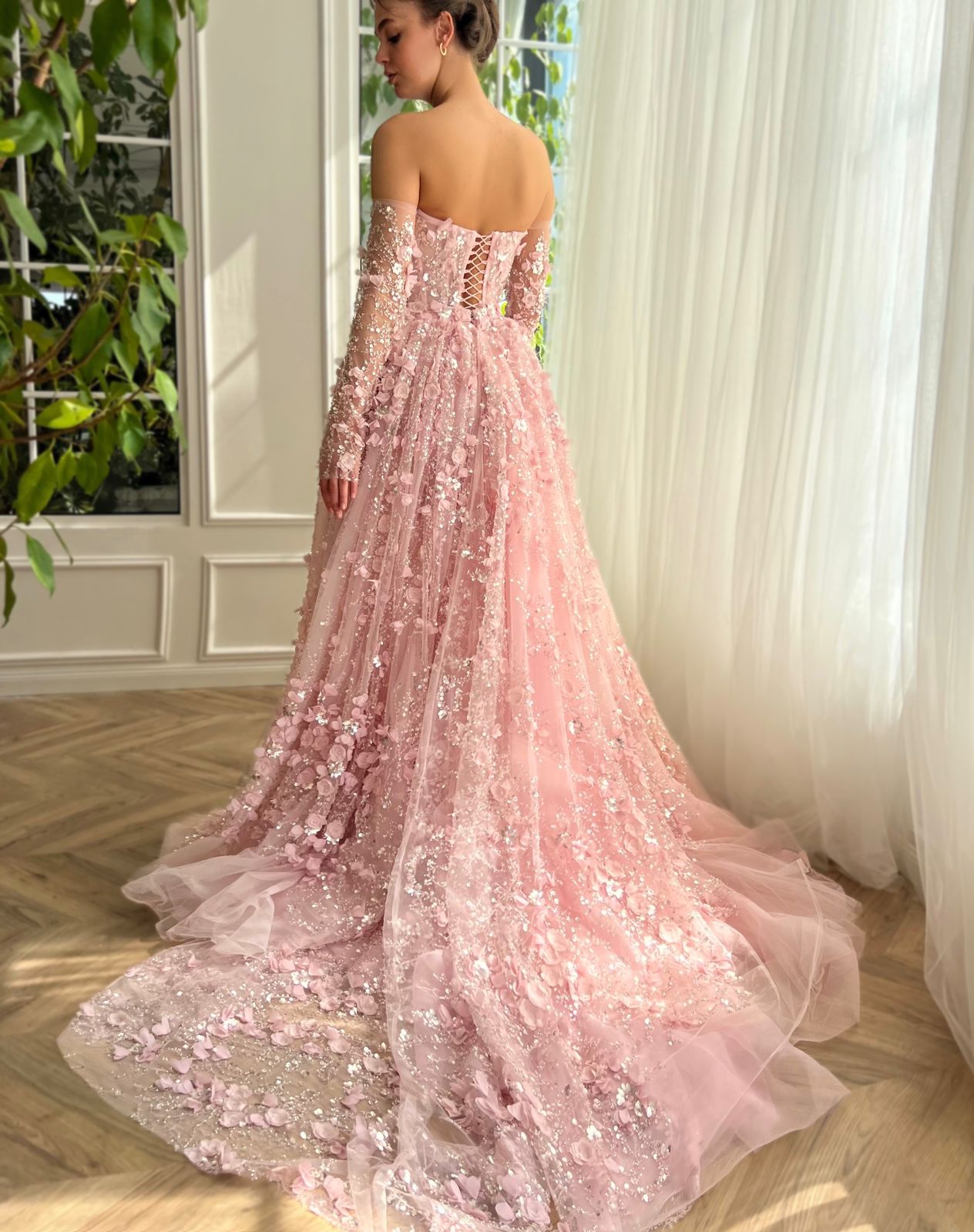 Pink overskirt and A-Line dress with long off the shoulder sleeves and embroidery