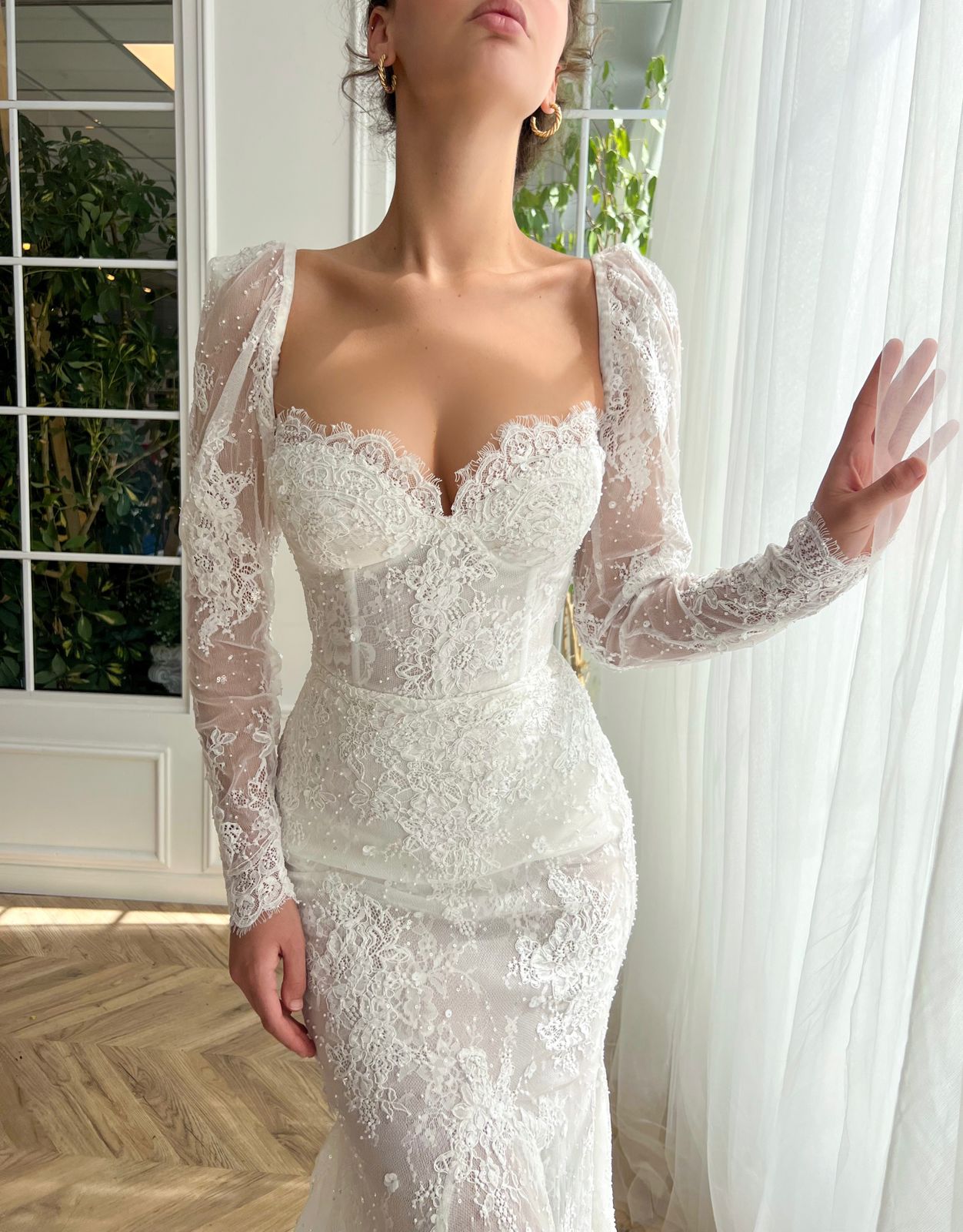 Mermaid white bridal dress with long sleeves and embroidery