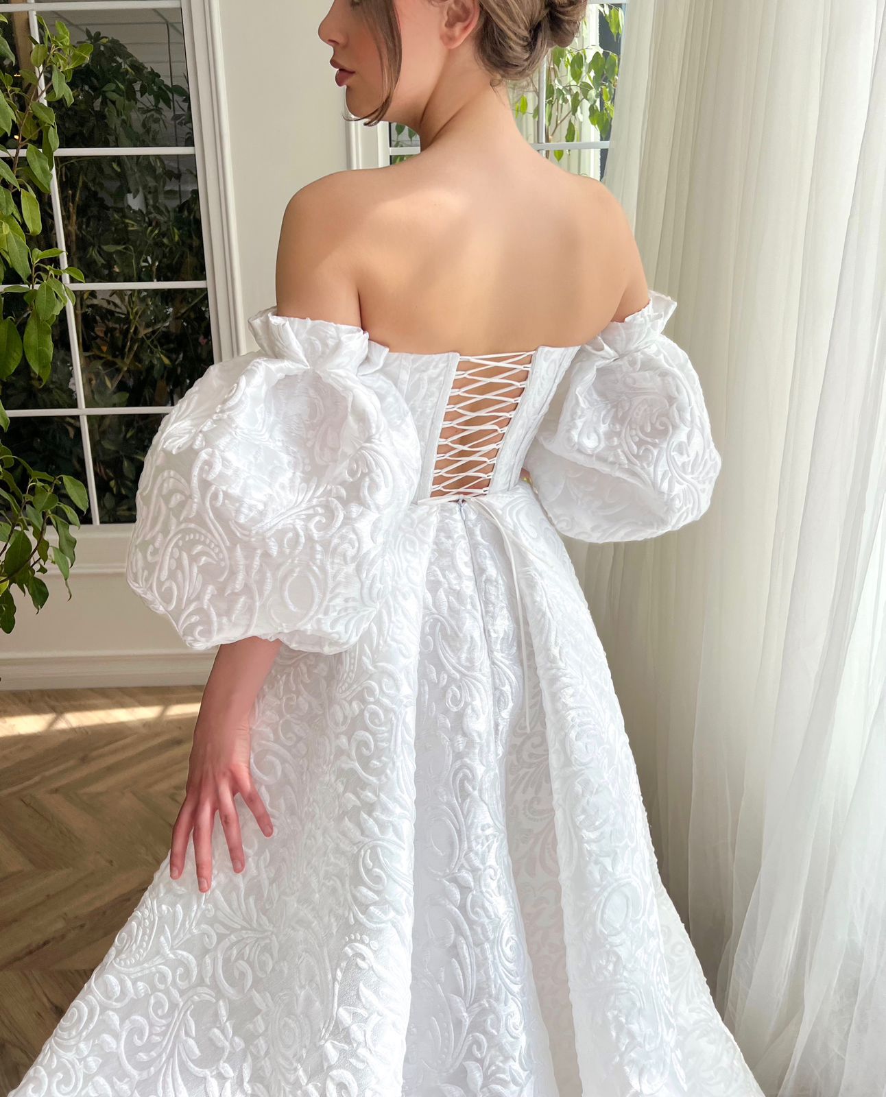 White A-Line bridal dress with spaghetti straps