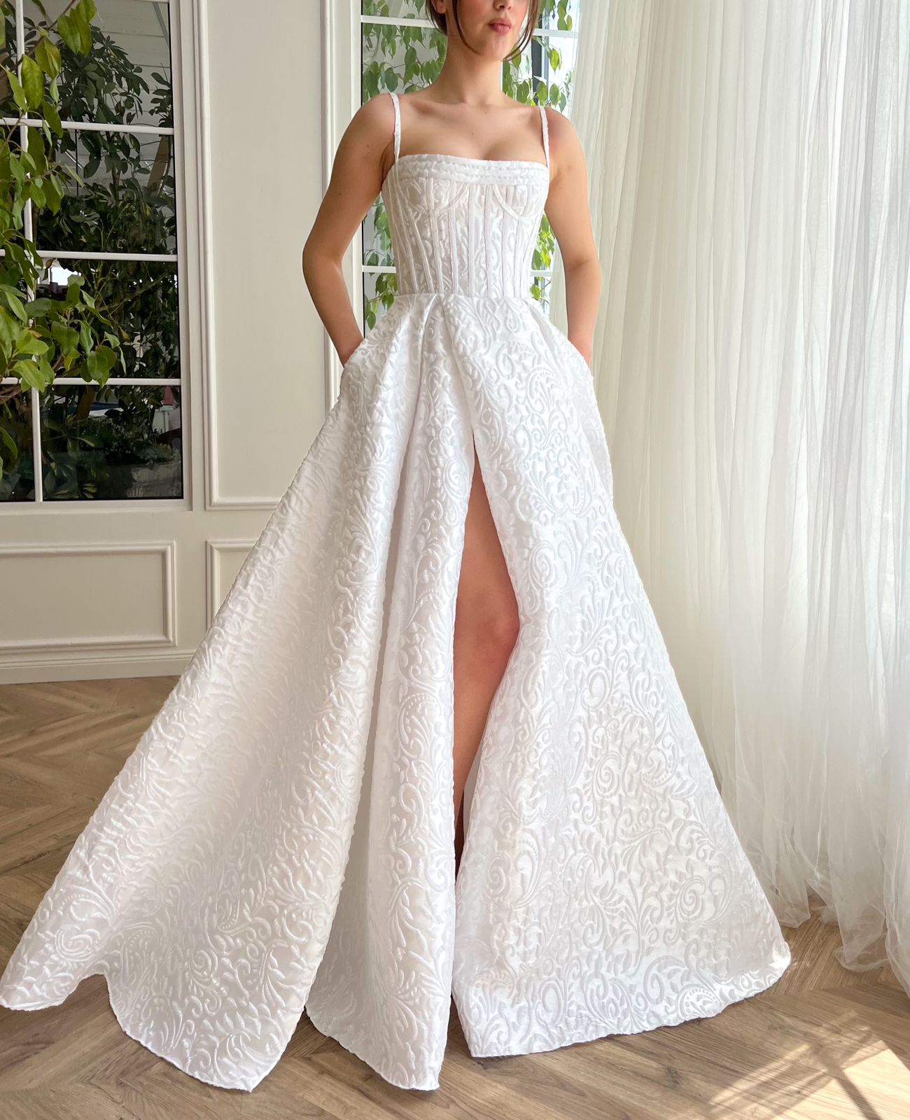 White A-Line bridal dress with spaghetti straps