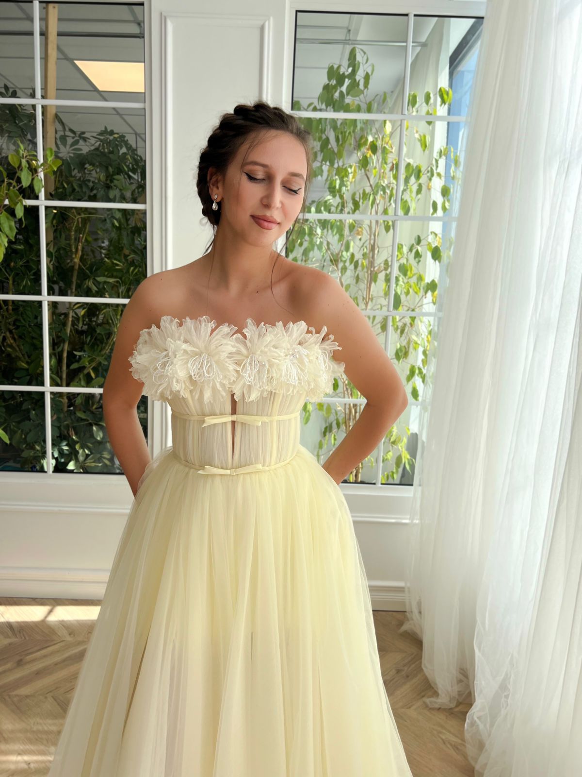 Yellow A-Line dress with no sleeves and embroidery