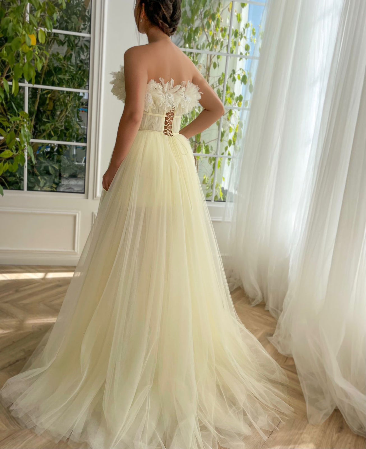 Yellow A-Line dress with no sleeves and embroidery
