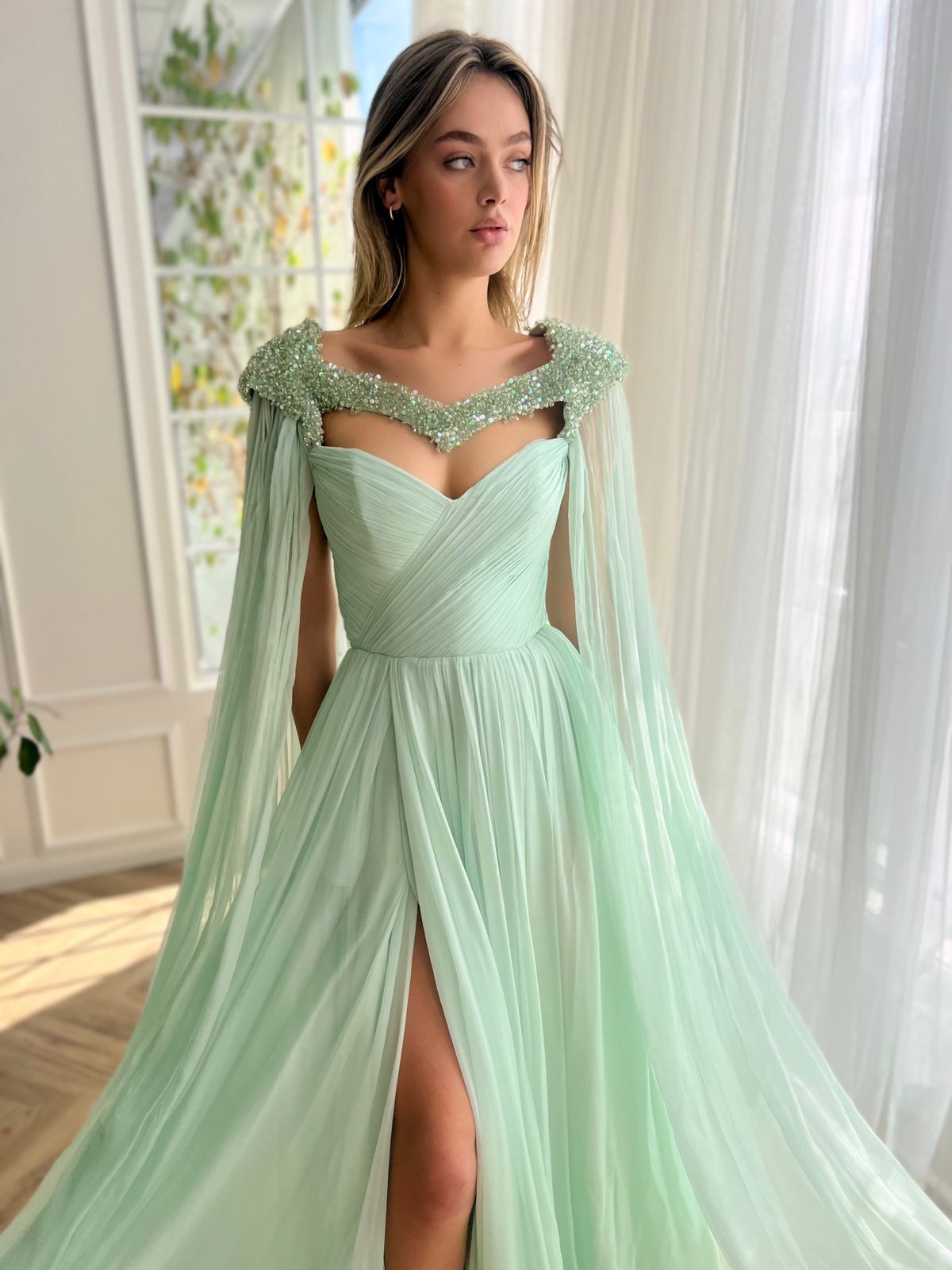 Green A-Line dress with cape and embroidery