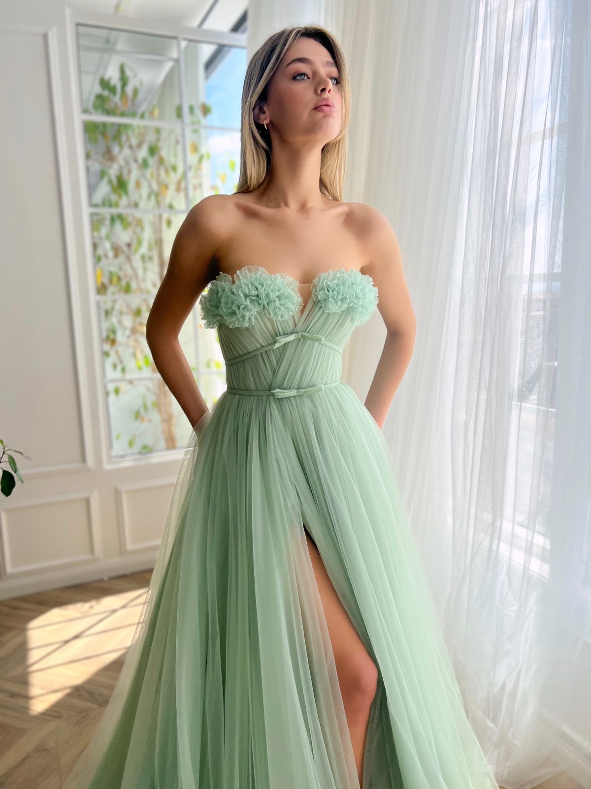 Green A-Line dress without sleeves and with embroidery