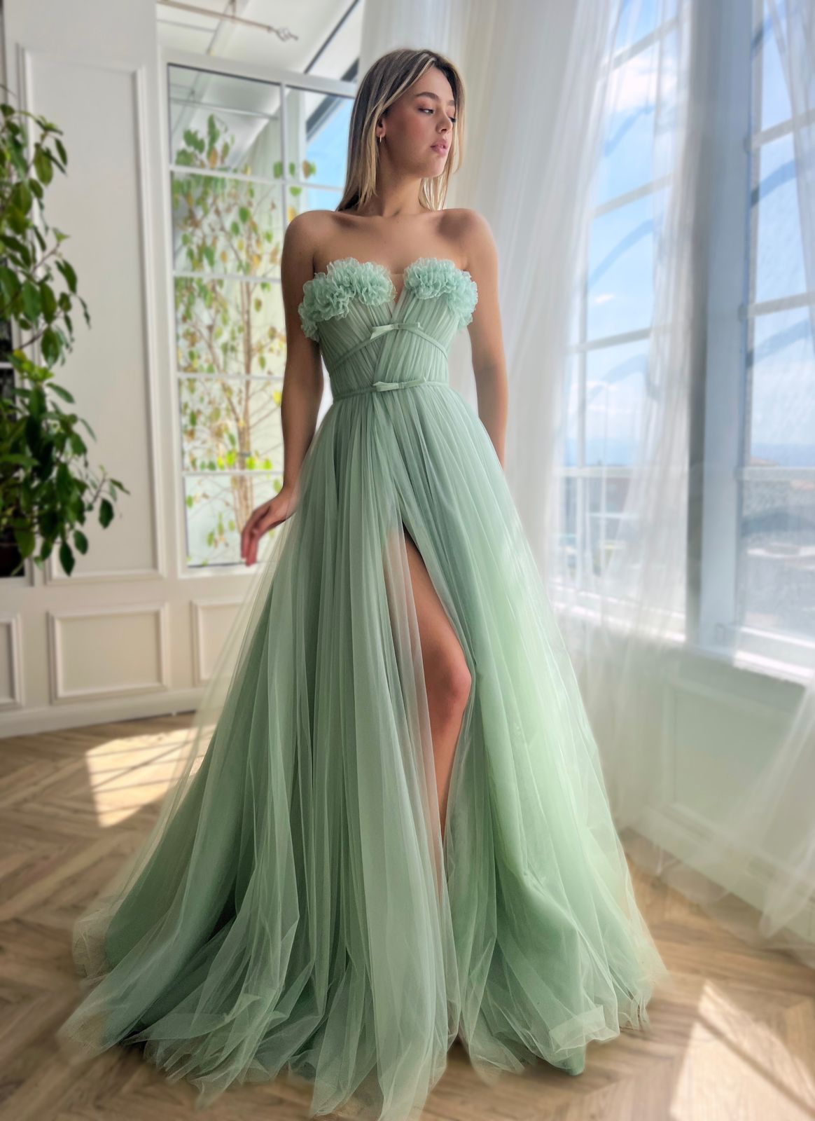 Green A-Line dress without sleeves and with embroidery
