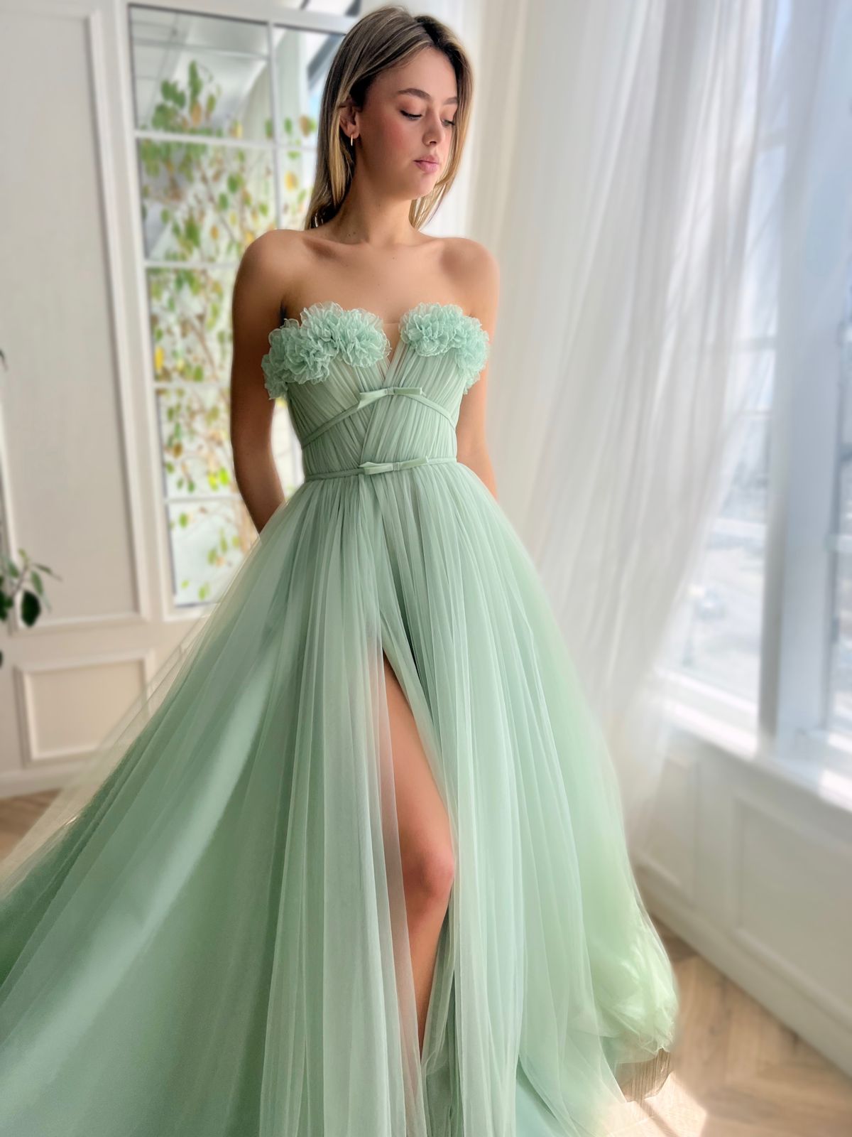 Green A-Line dress without sleeves and with embroidery
