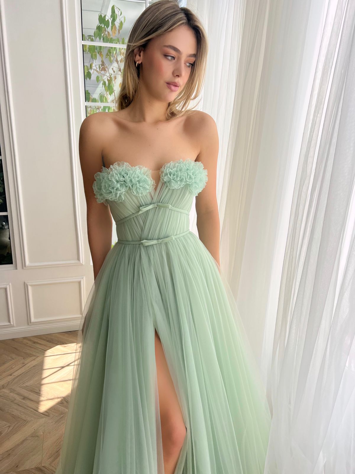 Green A-Line dress without sleeves and with embroidery