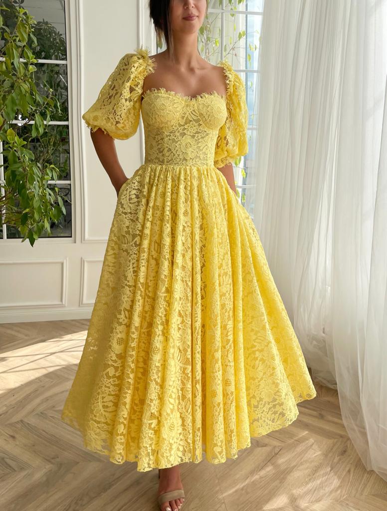 Yellow midi dress with short sleeves