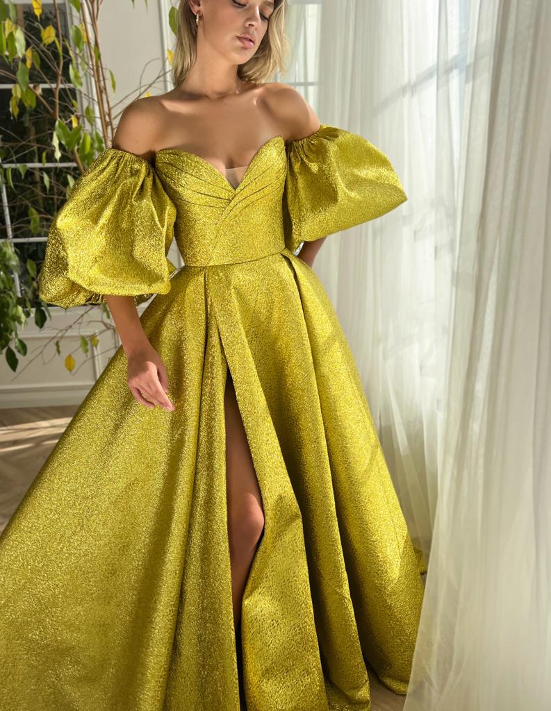 Yellow A-Line dress with short off the shoulder sleeves and shiny fabric