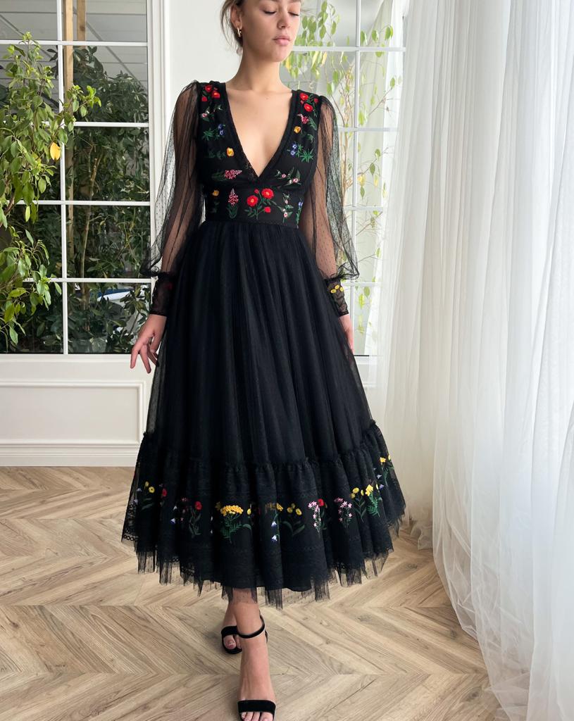 black dotted midi dress with v-neck, long sleeves and embroidery