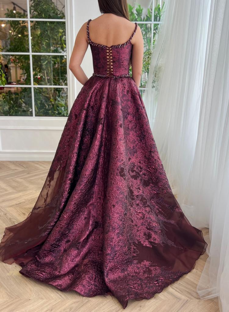 Purple A-Line dress with brocade fabric, spaghetti straps and embroidery