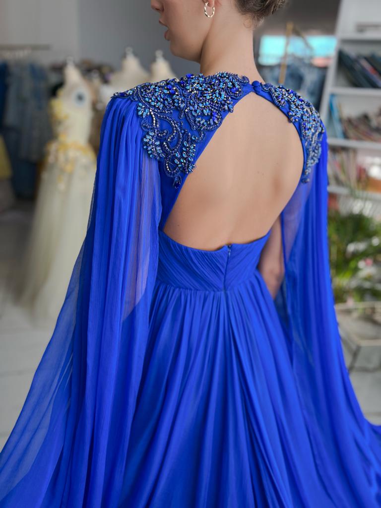Blue A-Line dress with v-neck, drape, embroidery and cape sleeves