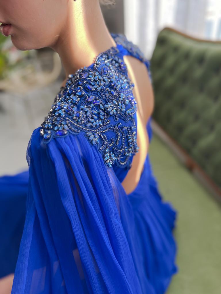 Blue A-Line dress with v-neck, drape, embroidery and cape sleeves