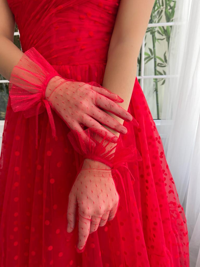 Red dotted midi dress with no sleeves and gloves