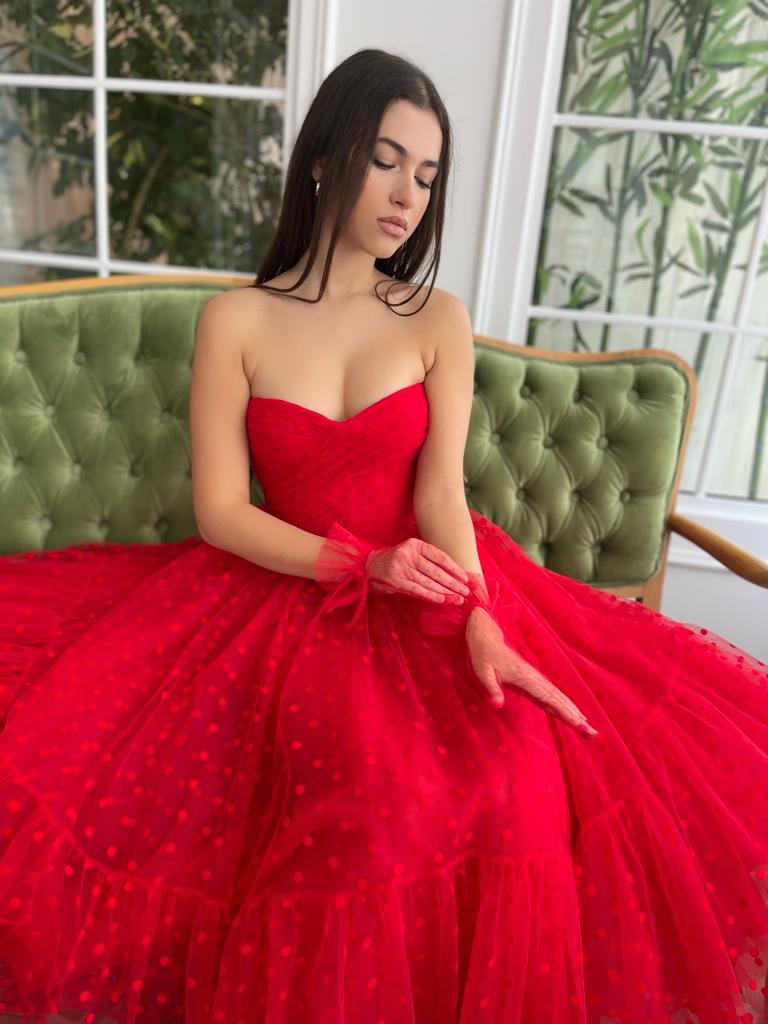 Red dotted midi dress with no sleeves and gloves