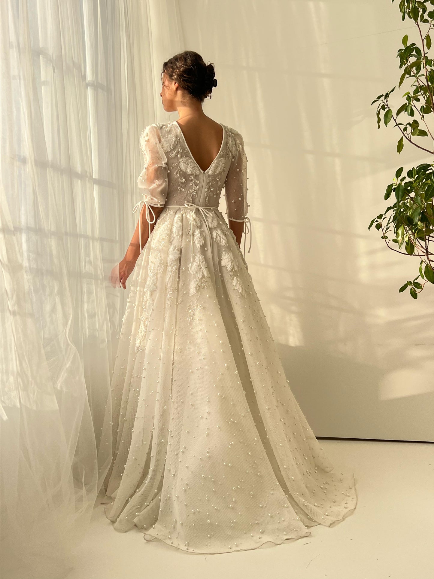 White bridal A-Line gown with short sleeves, v-neck, beading and embroidery