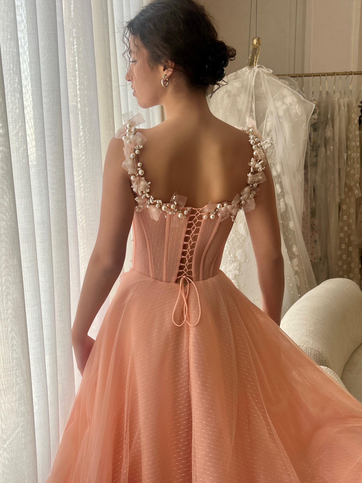 Peach A-Line gown with spaghetti straps and embroidery