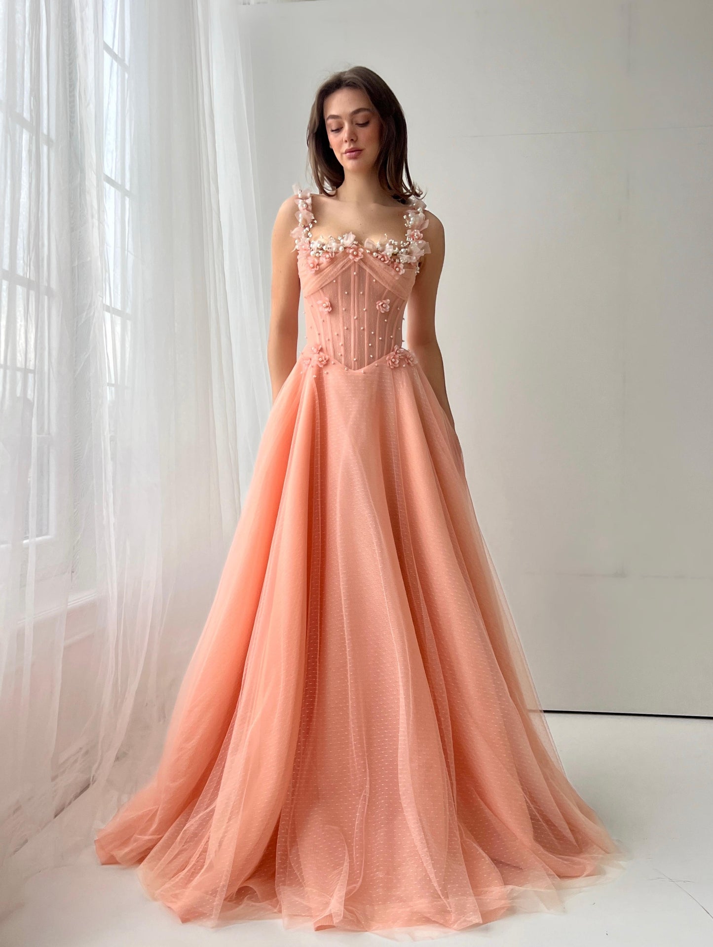 Peach A-Line gown with spaghetti straps and embroidery
