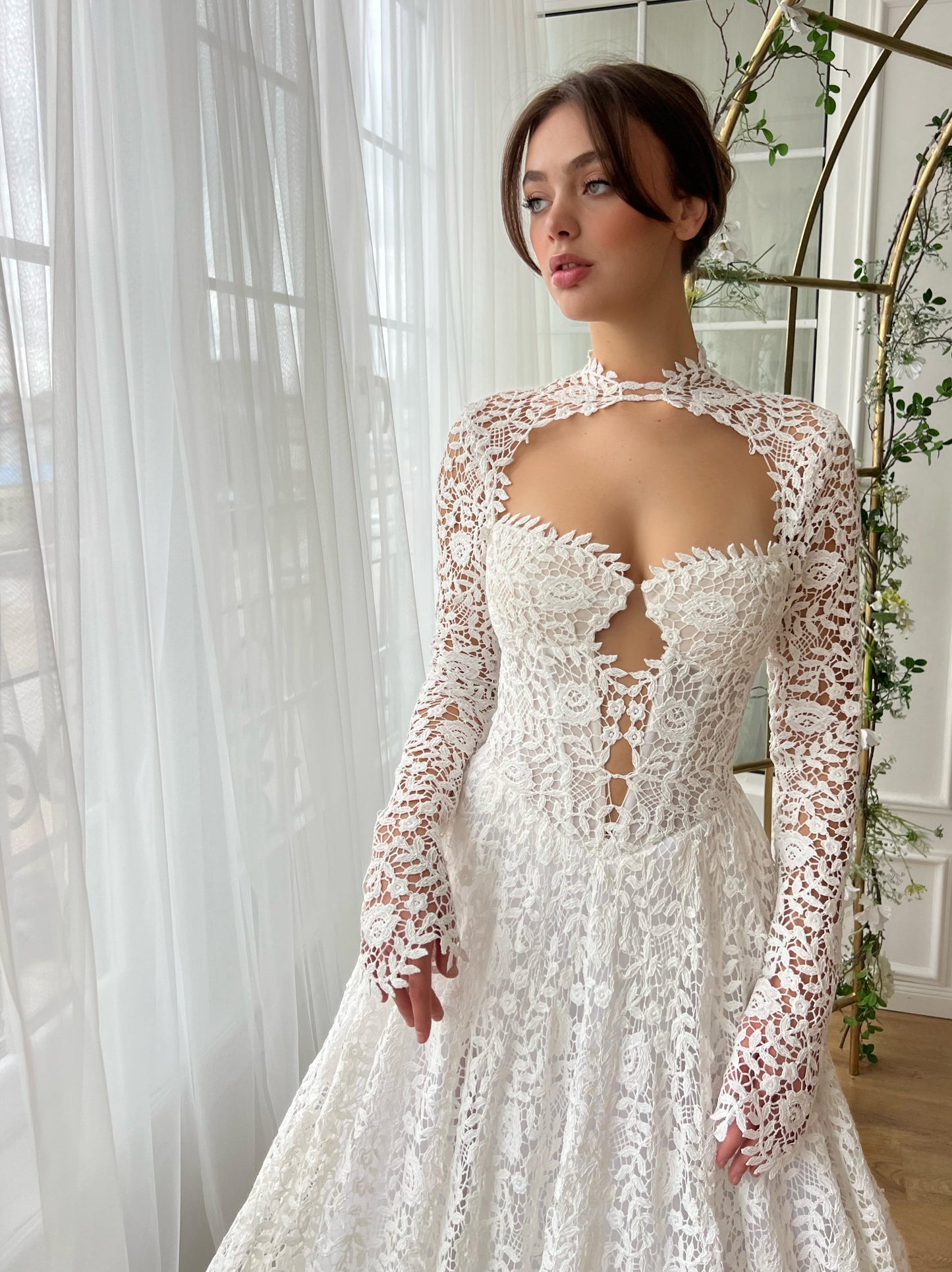 White A-Line bridal dress with long sleeves and embroidered lace